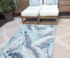 New 115cm x 170cm raised pile leaf tropical outdoor/indoor rug in distressed blue, grey and navy