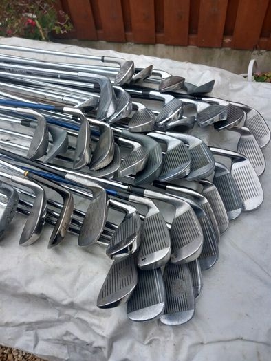 A selection of golf clubs and bags. NOT SELLING SEPARATE