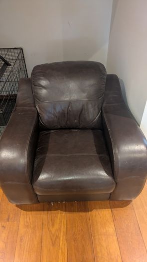 Dark brown leather armchair