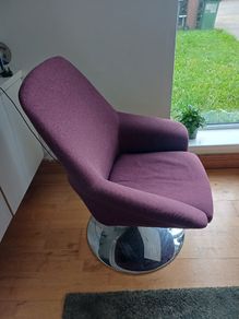Purple swivel armchair with chrome base