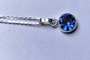 Silver Pendant with round royal blue Tanzanite stone