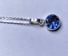 Silver Pendant with round royal blue Tanzanite stone