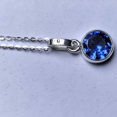 Silver Pendant with round royal blue Tanzanite stone