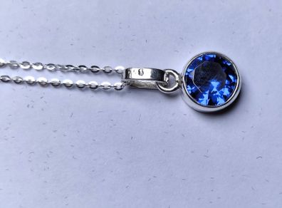 Silver Pendant with round royal blue Tanzanite stone