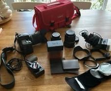 Nikon D80 with Sigma 18-200mm, Nikon 35mm, Tamron 10-24mm and filters and flashlight