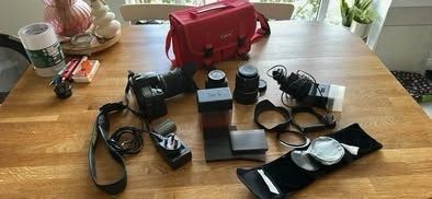 Nikon D80 with Sigma 18-200mm, Nikon 35mm, Tamron 10-24mm and filters and flashlight