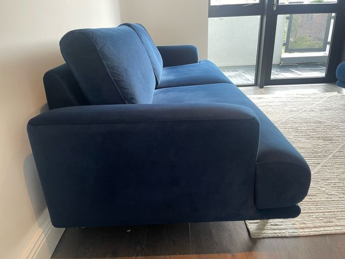 Navy velvet sofa and cuddle chair from Michael Murphy furniture