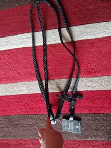 Showing plaited reins