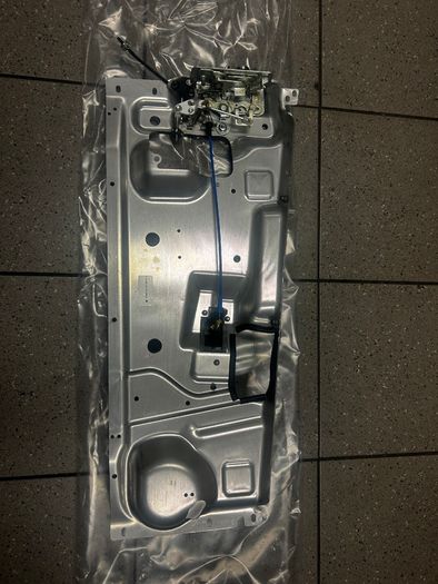Part number: A9567200679. Drivers side door lock & carrier.
