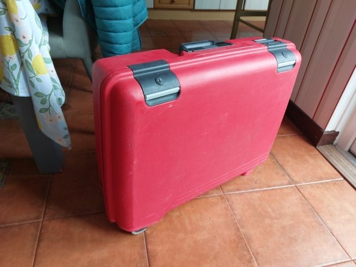Red hard-shell suitcase