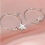 Silver earrings with star charms Image 2