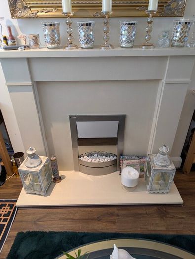 fireplace surround with an electric fan heater