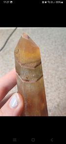 Yellow fluorite towerbwith mud inclusions