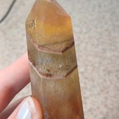 Yellow fluorite towerbwith mud inclusions