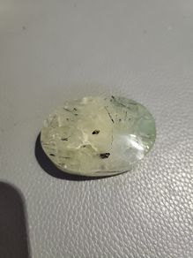 Prehnite crystal with rutile