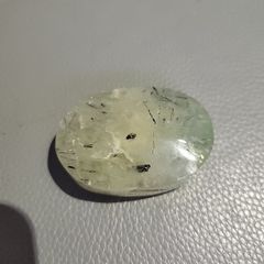 Prehnite crystal with rutile