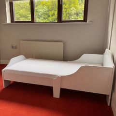 Toddler bed including mattress