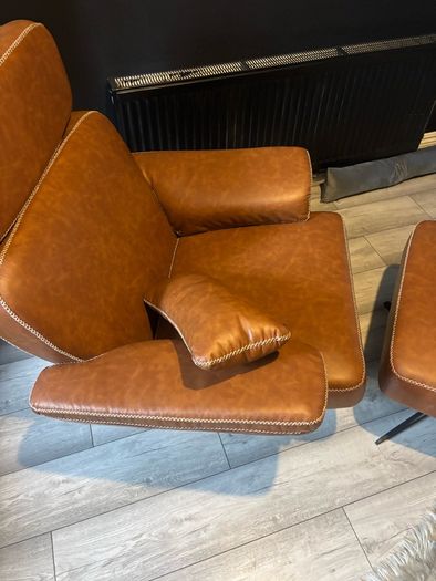 Practically new armchair and footstool
