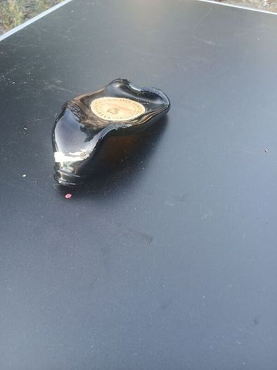 melted guiness bottles