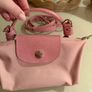 pink Longchamp Le Pliage mini top-handle bag with a detachable shoulder strap Image 2