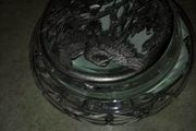 Cut glass crystal trinket dish with carved pewter lid.