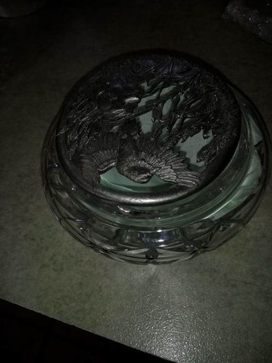 Cut glass crystal trinket dish with carved pewter lid.