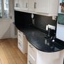 kitchen cabinets and black marble countertop Image 3