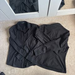 Two black shirts