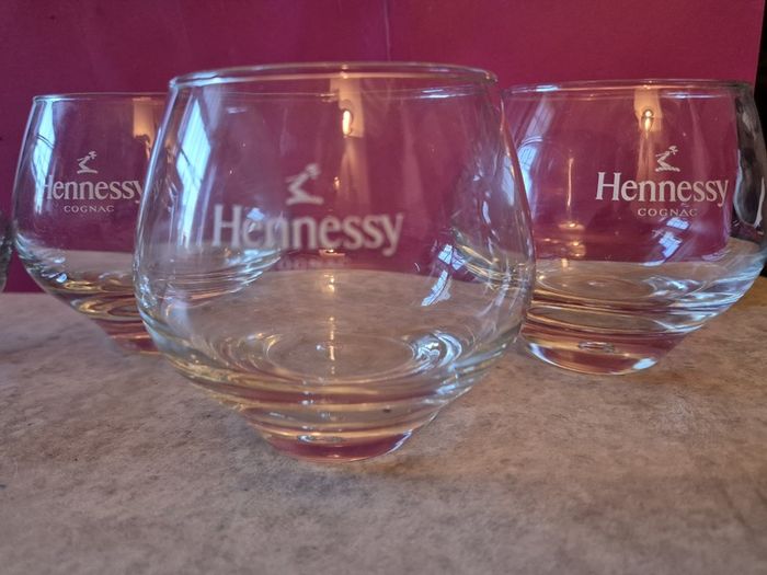A Set of 4 Hennessy Cognac Glasses Branded with the Hennessy Cognac Logo