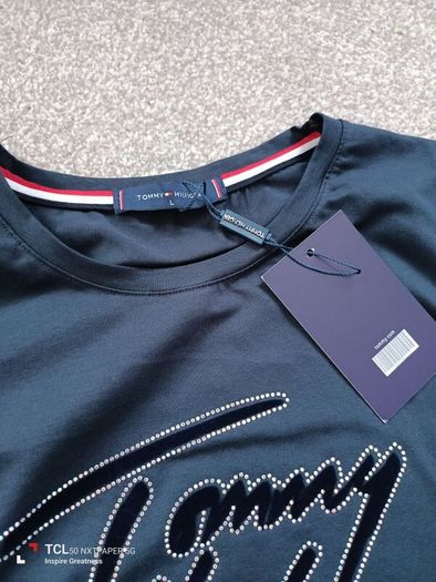 New.women's t-shirt. Size 14