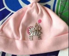 Girls BNWT hat 6/12 mths