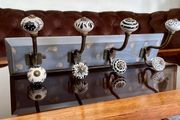 New Unused Stylish Entryway Mounted Ceramic and Brass Coat Hanger