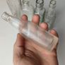 243 - Set of 5 Vintage Clear Glass Cork Top Collectible Decorative Bottles Image 2