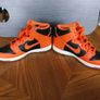 Orange and Black Nike hi tops Image 4
