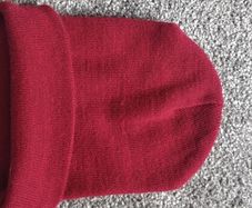 Maroon warm cap never worn  boy junior size size uni