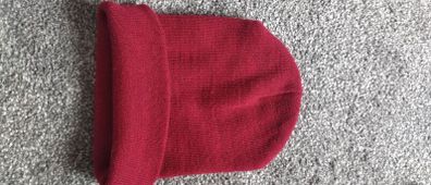 Maroon warm cap never worn  boy junior size size uni