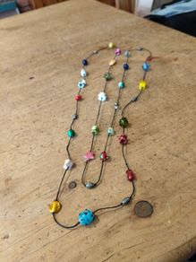handmade funky necklace featuring a variety of colourful glass and stone beads