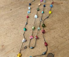 handmade funky necklace featuring a variety of colourful glass and stone beads
