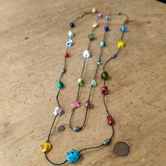 handmade funky necklace featuring a variety of colourful glass and stone beads