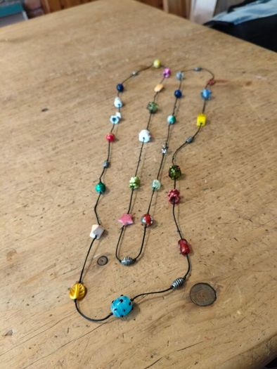 handmade funky necklace featuring a variety of colourful glass and stone beads