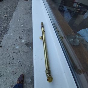 Old brass rose bush sprayer
