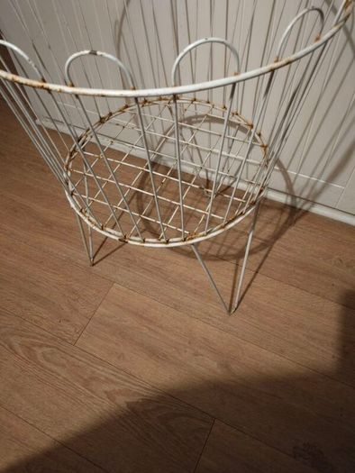 Circular Iron shop stand.