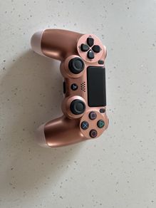 Rose gold ps4 controller ( mint condition and genuine )