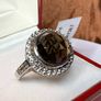 A beautiful silver ring with smokey quartz and white topaz. Image 6