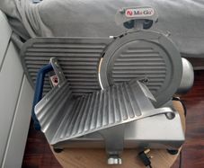 The Ma-Ga 310P2 gravity slicer is a machine I recommend.