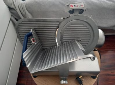 The Ma-Ga 310P2 gravity slicer is a machine I recommend.