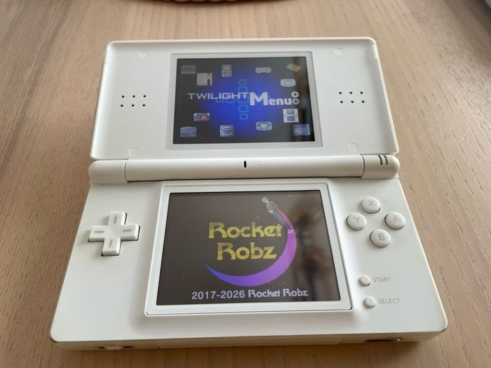 Modded Nintendo ds lite crystal white USG 001 boxed with manual with Flash Card 8gb with Games and retro games pokemon