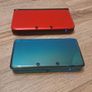 Red Nintendo 3DS xl and Aqua Blue Nintendo 3DS Image 4