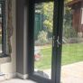 Two anthracite (grey) uPVC doors and one window Image 6