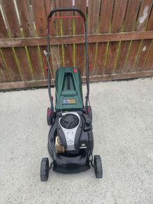 push petrol lawn mower with Briggs and Stratton engine very reliable starts easy runs perfect